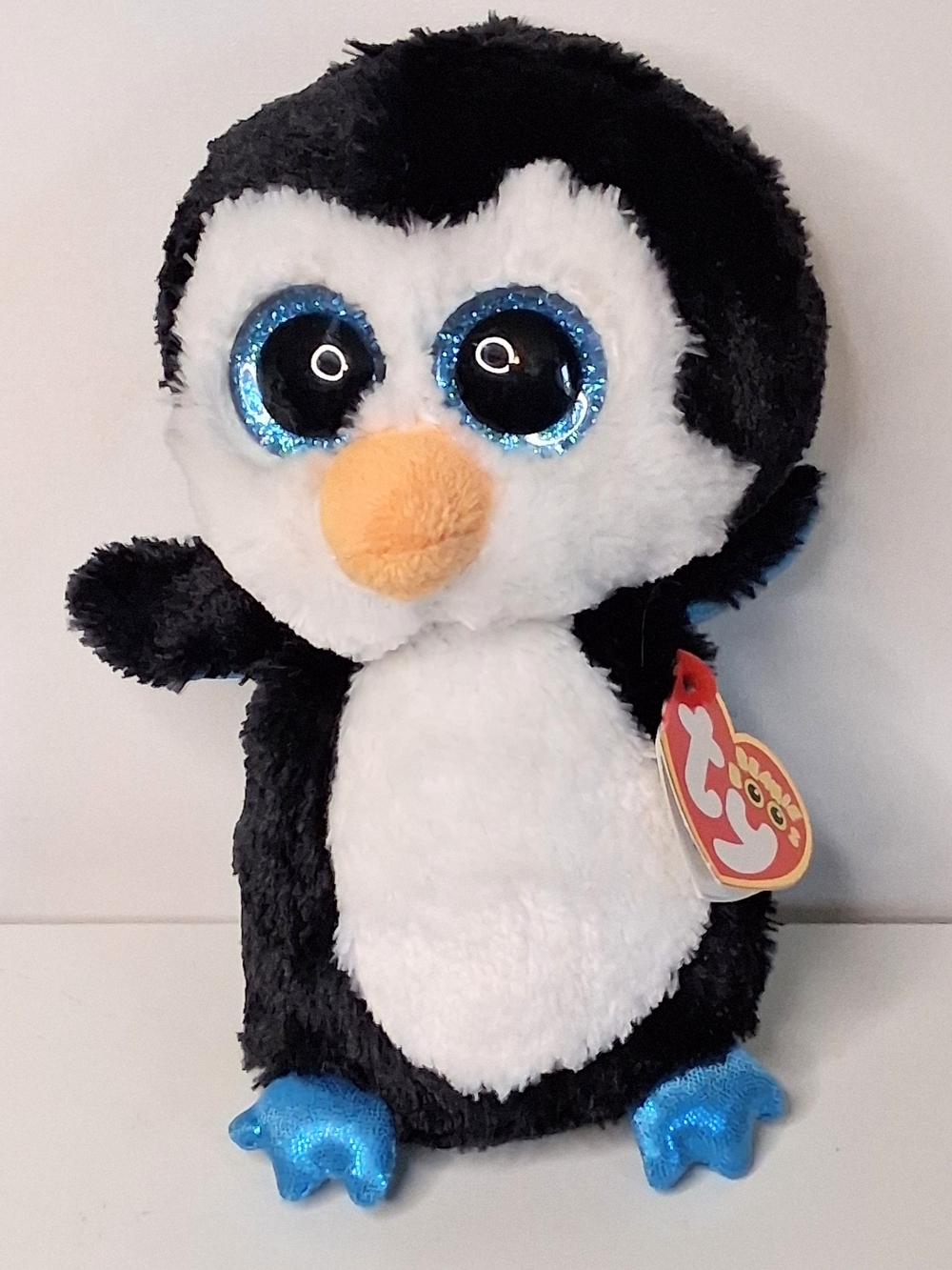 Ty Black & White Penguin Plush with Sparkling Blue Eyes and Blue Feet